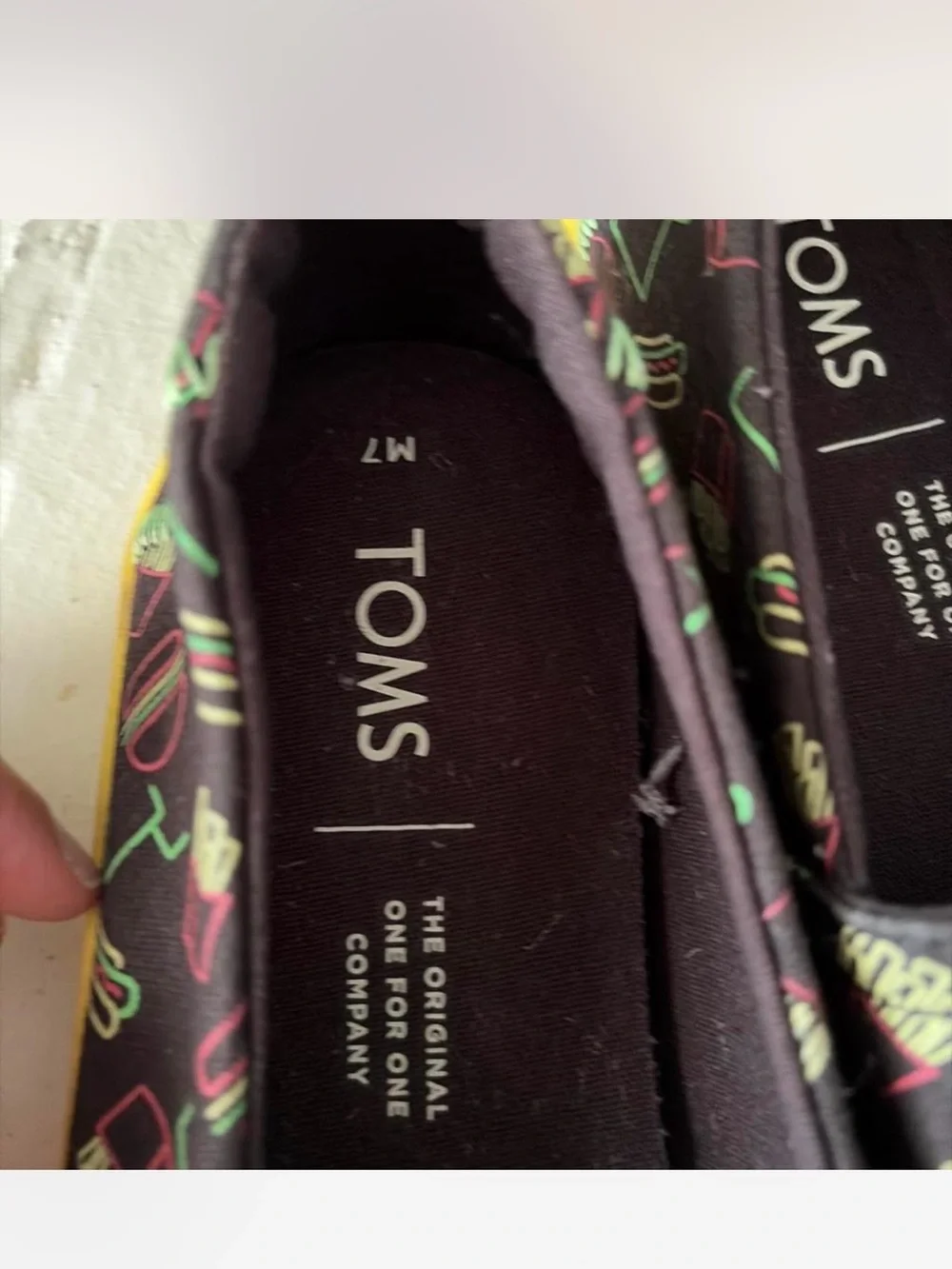 TOMS Black Slip-On Sneakers with Neon Diner Print and Yellow Sole